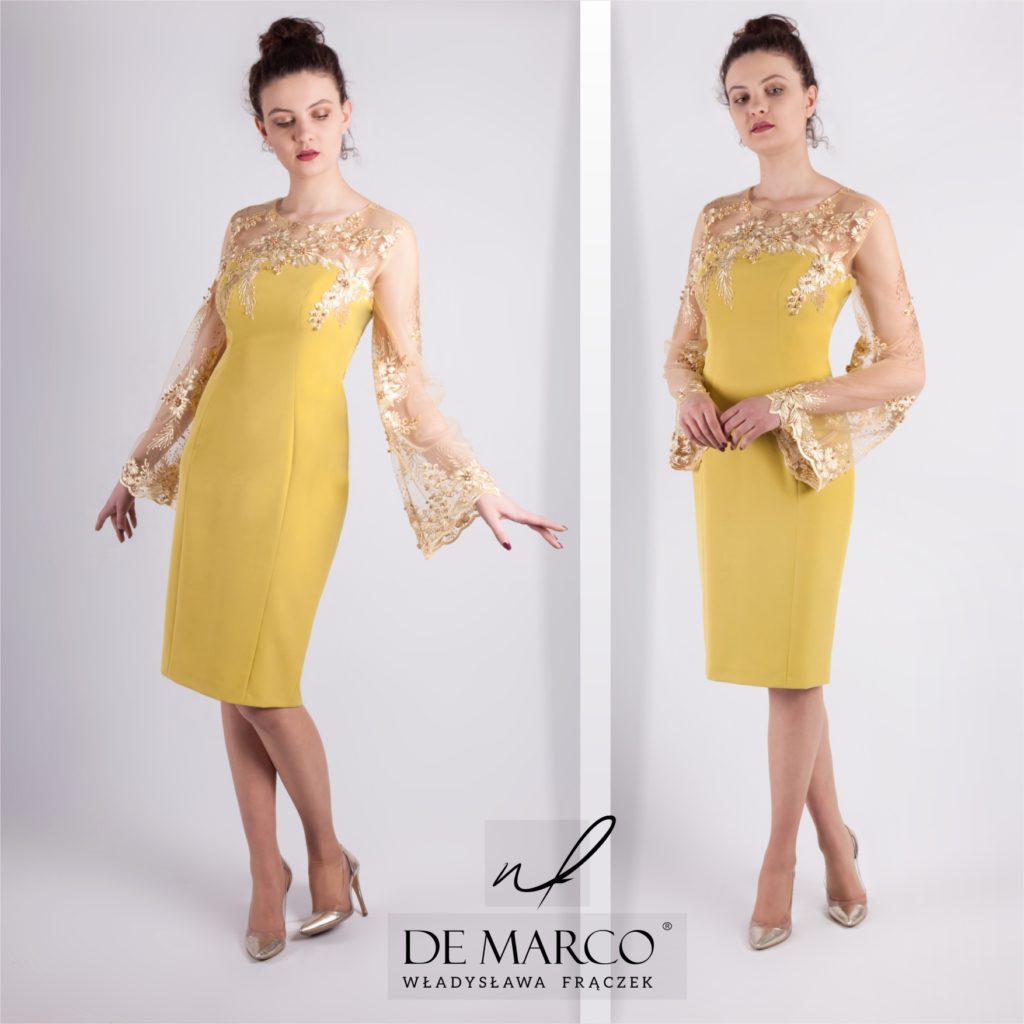 Musztardowa sukienka ze złotą koronką dla mamy wesela. Szycie na miarę u projektanta. Sklep De Marco z ekskluzywną odzieżą damską. 